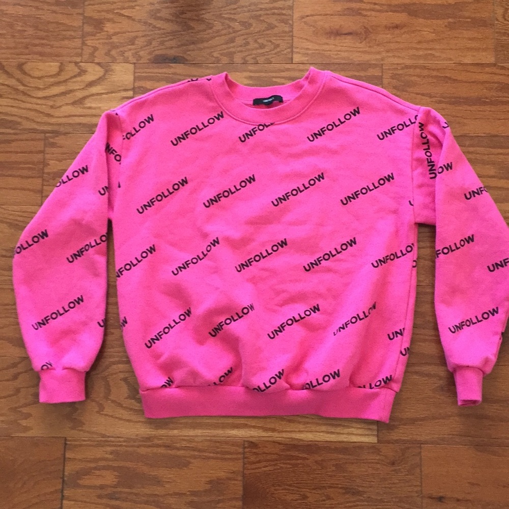 Forever 21 “Unfollow” pink and black sweatshirt